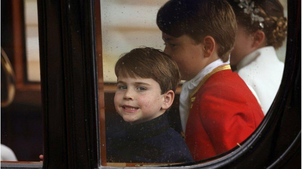 Prince Louis, Page of Honour Prince George and Princess Charlotte of Wales depart the Coronation service of King Charles III and Queen Camilla 